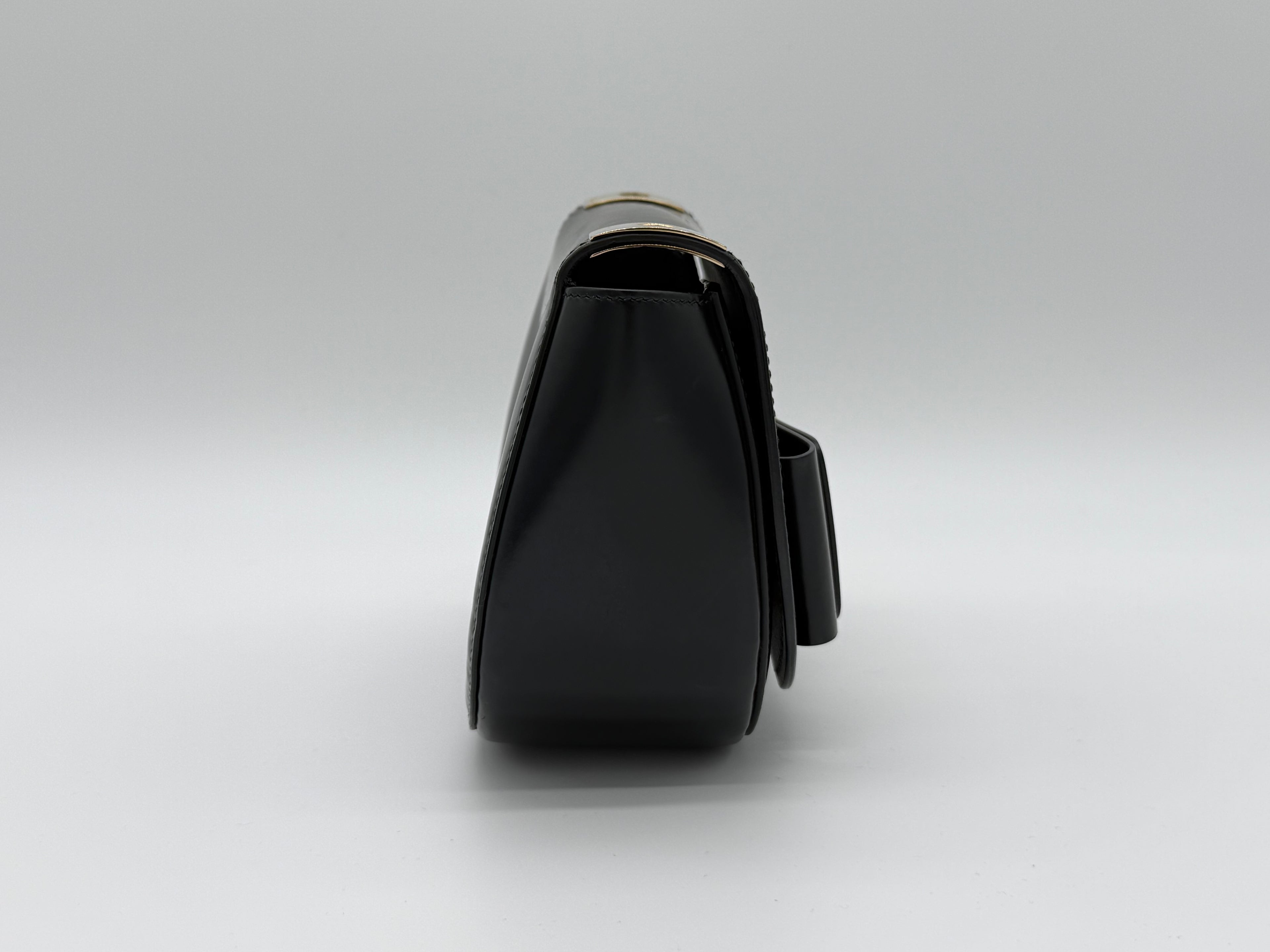 Salvatore Ferragamo Vara Shoulder Bag – Black Leather with Gold Hardware (SKU: gh921)