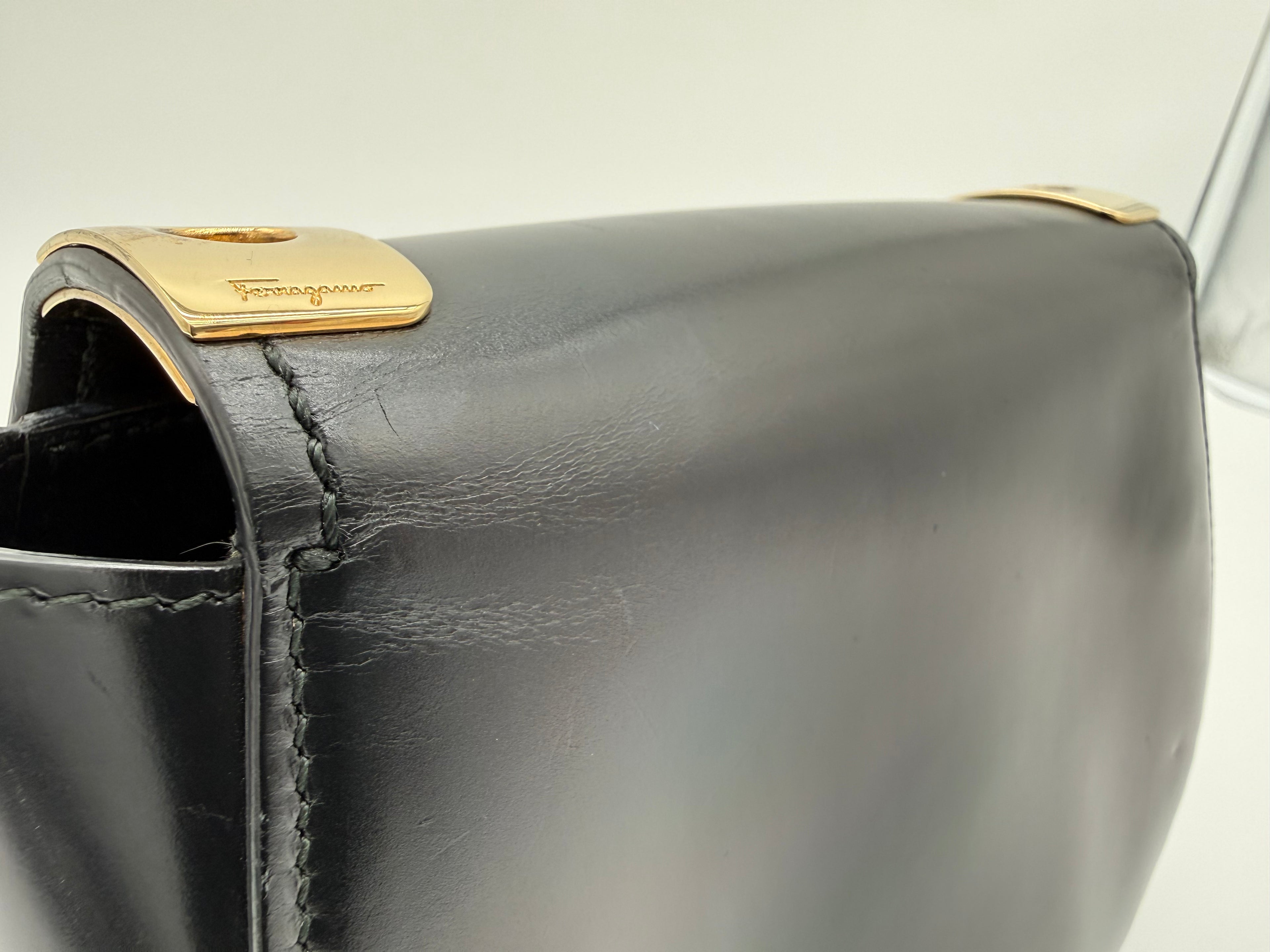 Salvatore Ferragamo Vara Shoulder Bag – Black Leather with Gold Hardware (SKU: gh921)