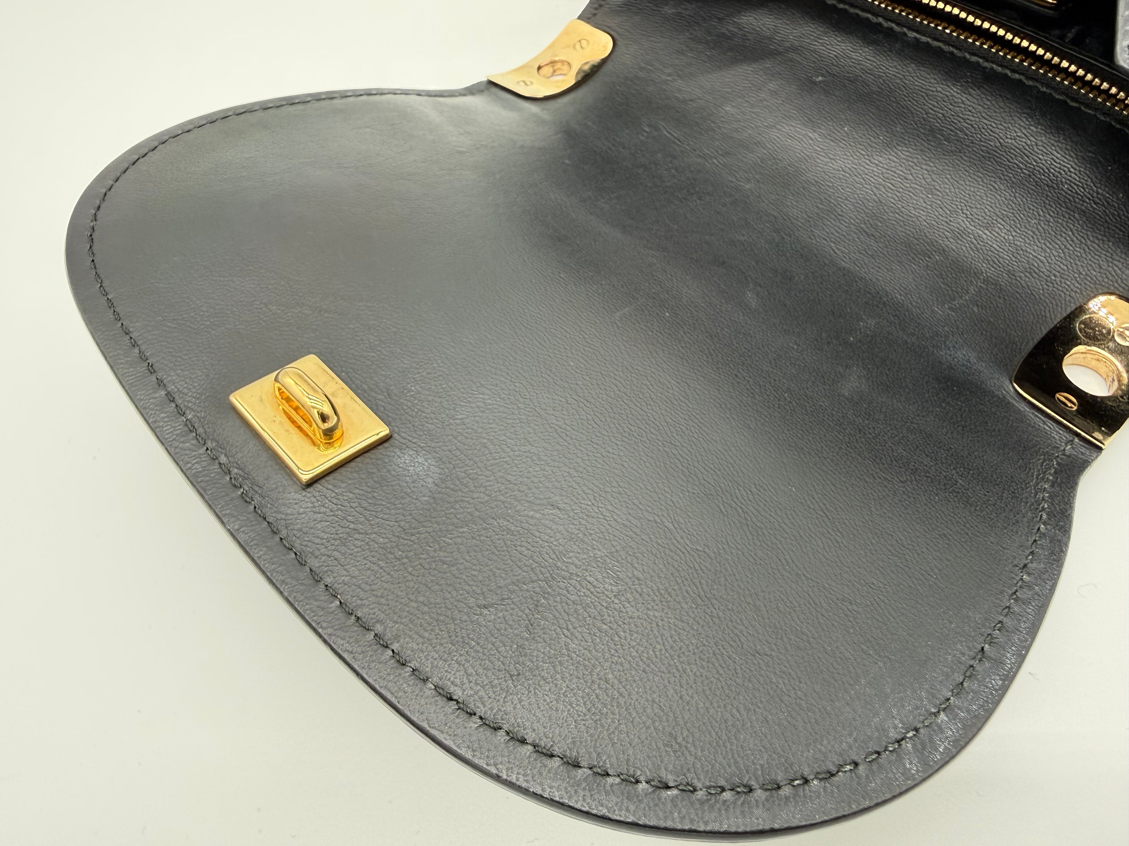 Salvatore Ferragamo Vara Shoulder Bag – Black Leather with Gold Hardware (SKU: gh921)