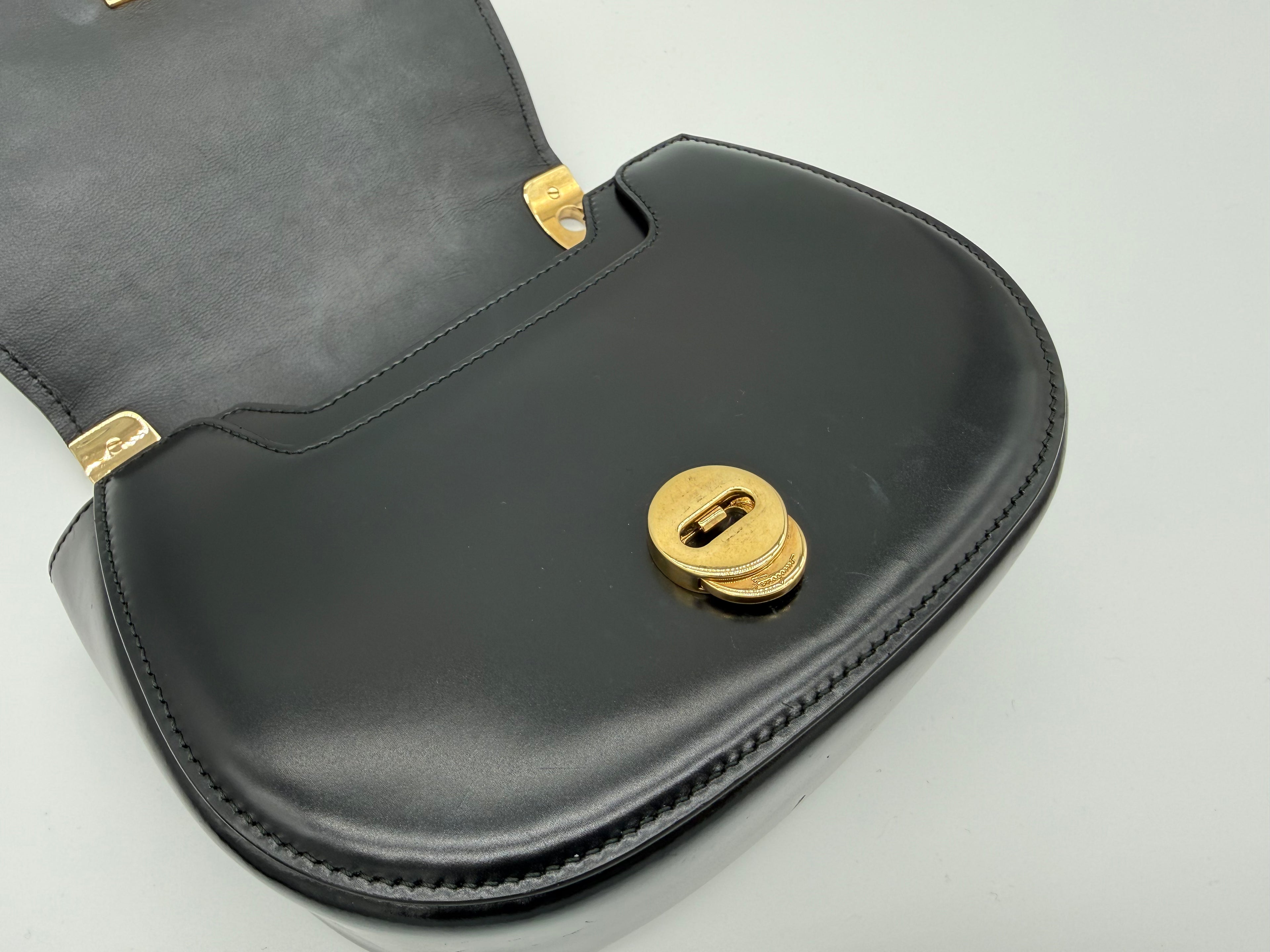 Salvatore Ferragamo Vara Shoulder Bag – Black Leather with Gold Hardware (SKU: gh921)