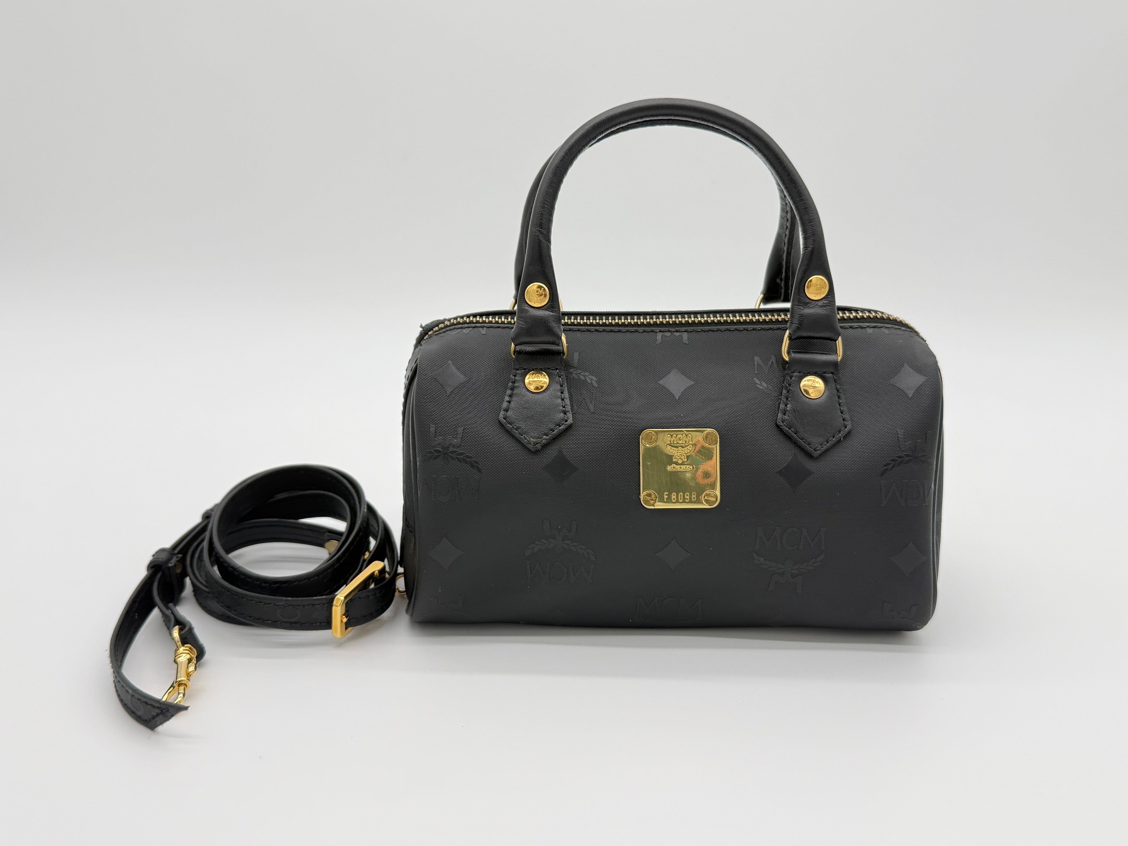 MCM Visetos Logogram 2-Way Hand Bag – Black PVC Leather with Gold Hardware (SKU: gh828)