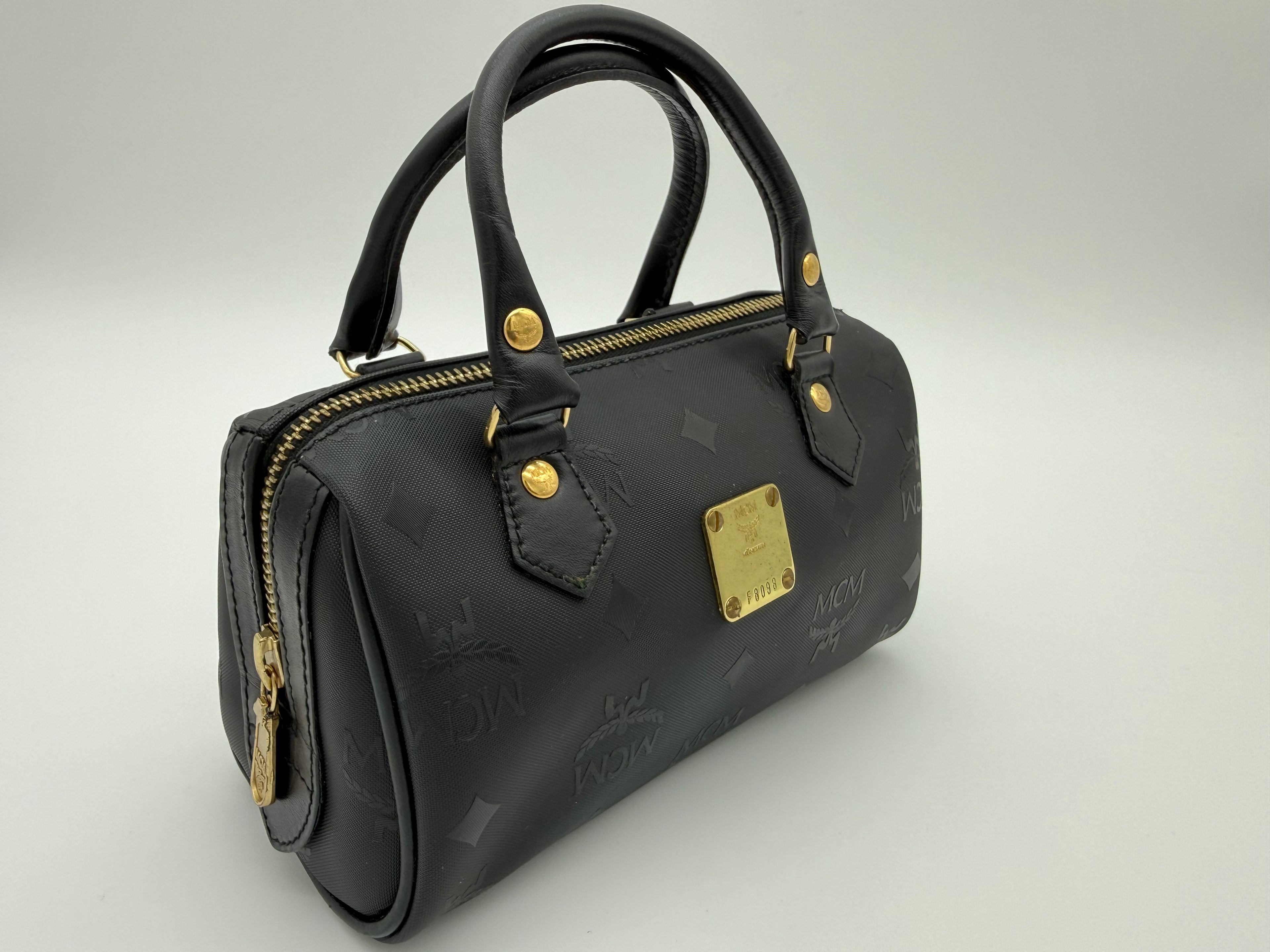 MCM Visetos Logogram 2-Way Hand Bag – Black PVC Leather with Gold Hardware (SKU: gh828)