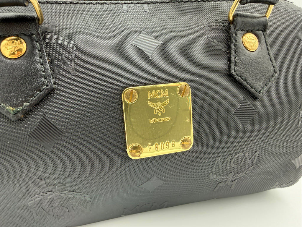 MCM Visetos Logogram 2-Way Hand Bag – Black PVC Leather with Gold Hardware (SKU: gh828)