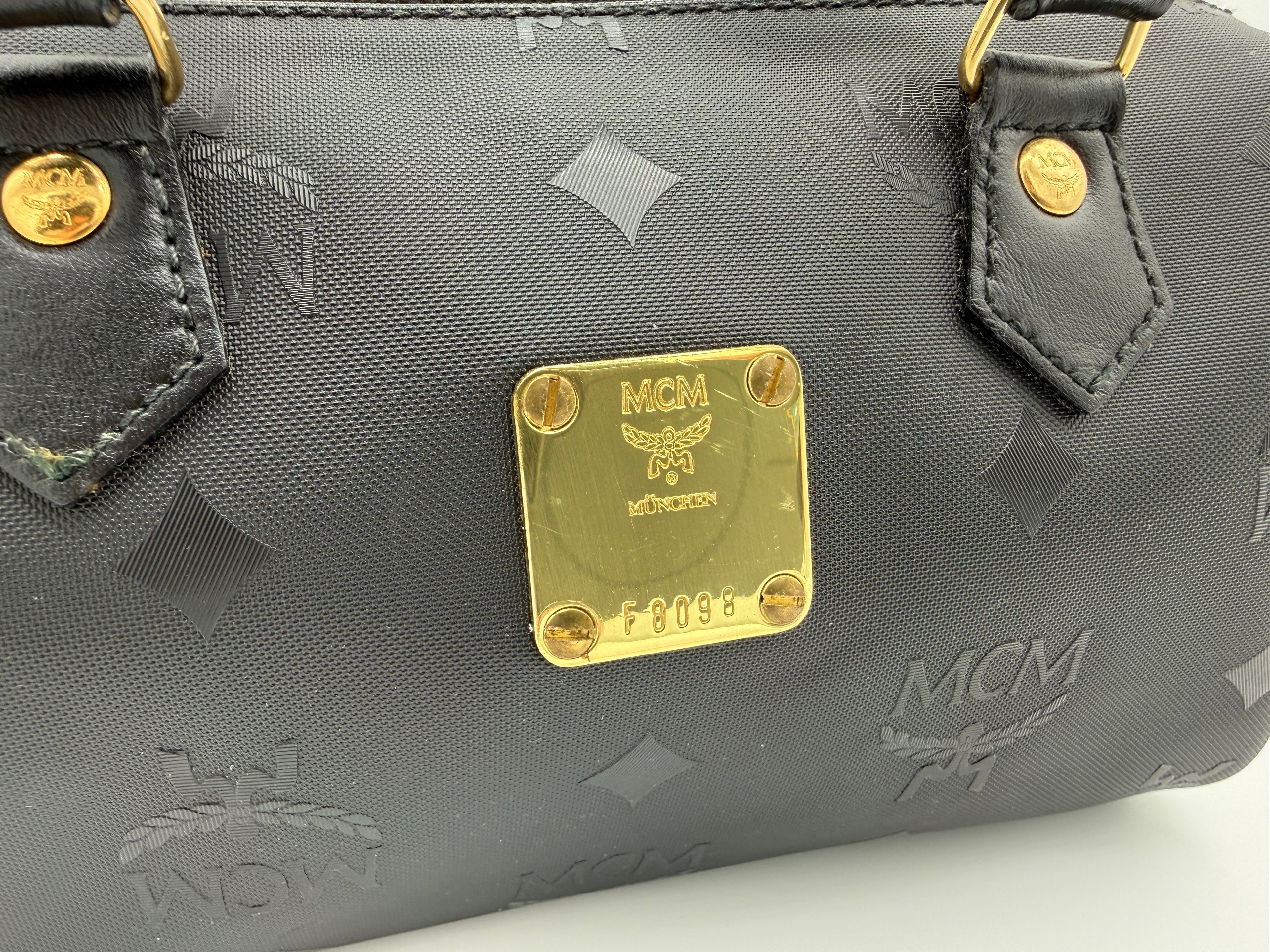 MCM Visetos Logogram 2-Way Hand Bag – Black PVC Leather with Gold Hardware (SKU: gh828)
