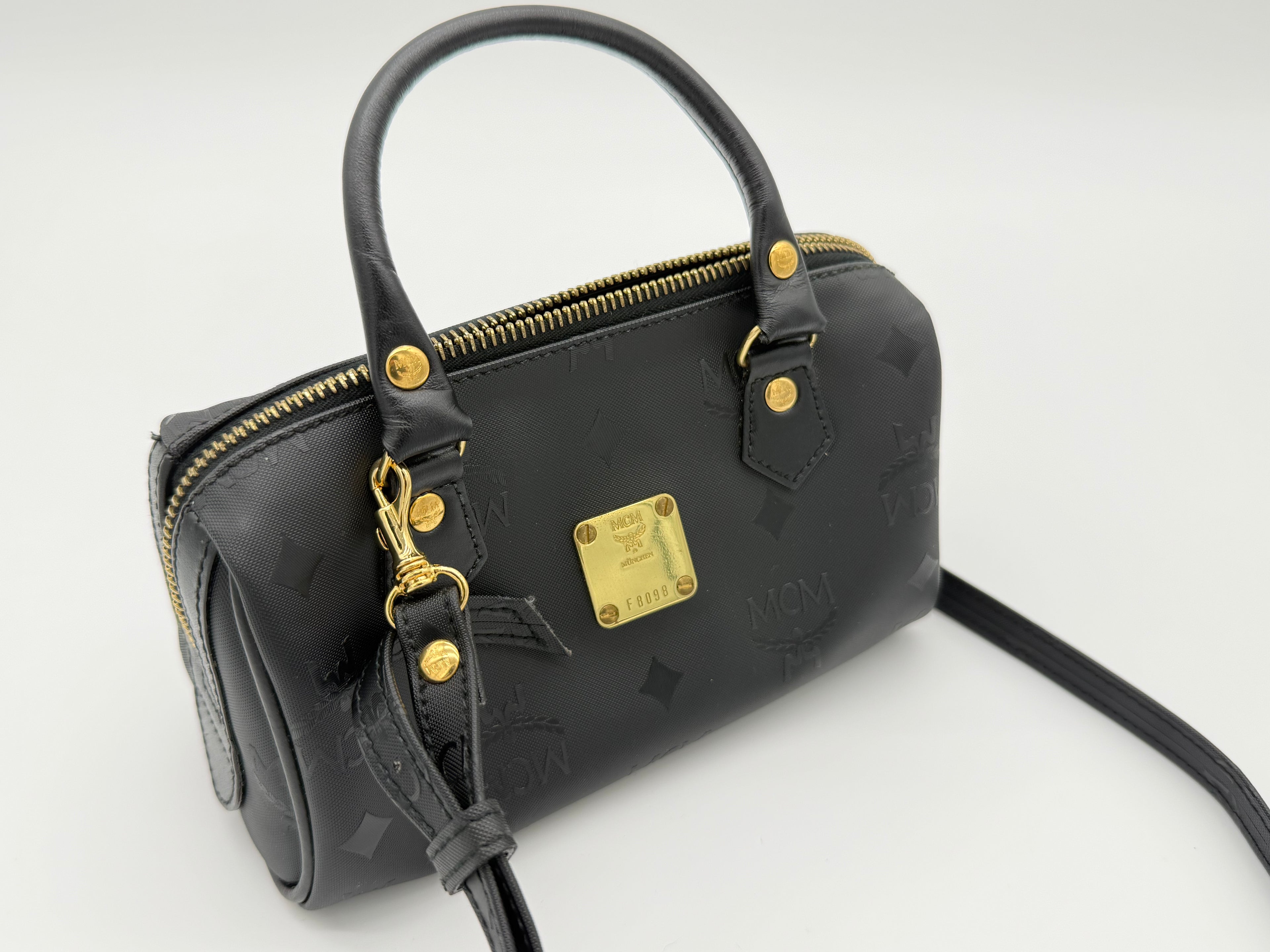 MCM Visetos Logogram 2-Way Hand Bag – Black PVC Leather with Gold Hardware (SKU: gh828)