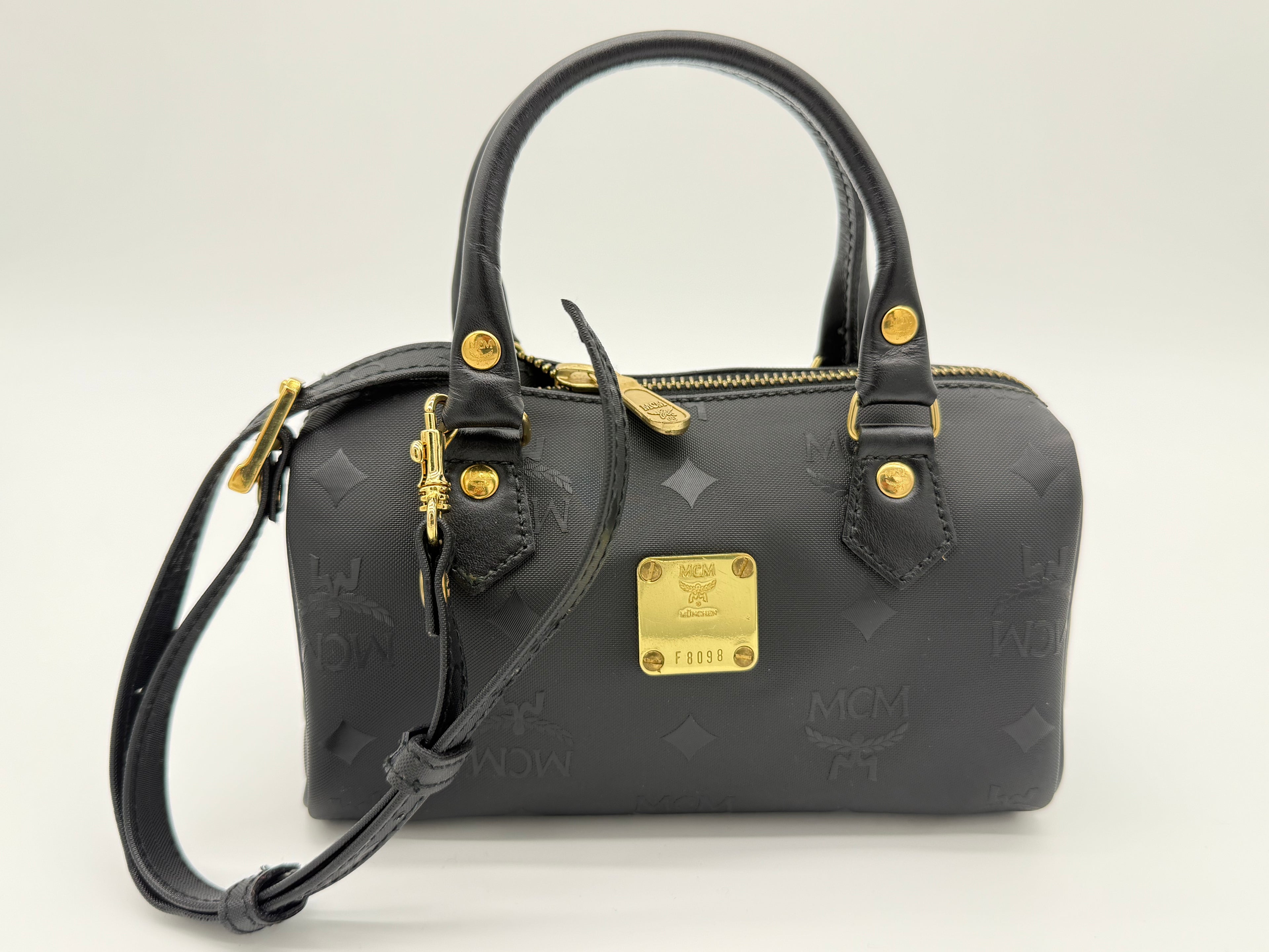 MCM Visetos Logogram 2-Way Hand Bag – Black PVC Leather with Gold Hardware (SKU: gh828)